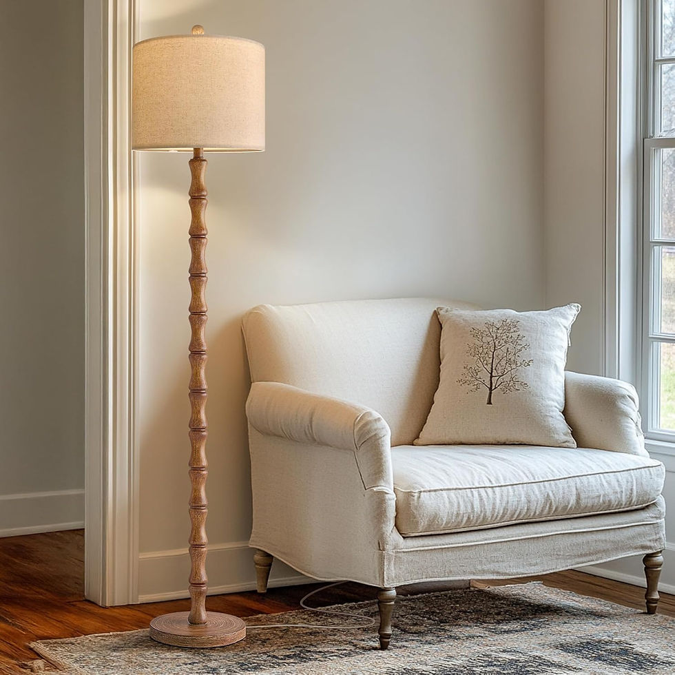 This turned wood floor lamp adds natural texture and timeless charm to a living room or bedroom. The sculptural base paired with a warm linen shade creates soft lighting that feels cozy, classic, and effortlessly layered.