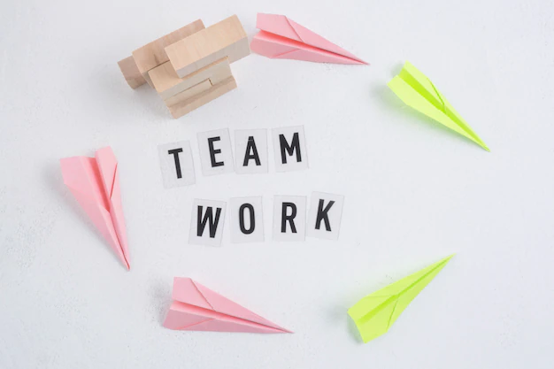 teamwork-concept-with-paper-planes_23-2148186969.webp