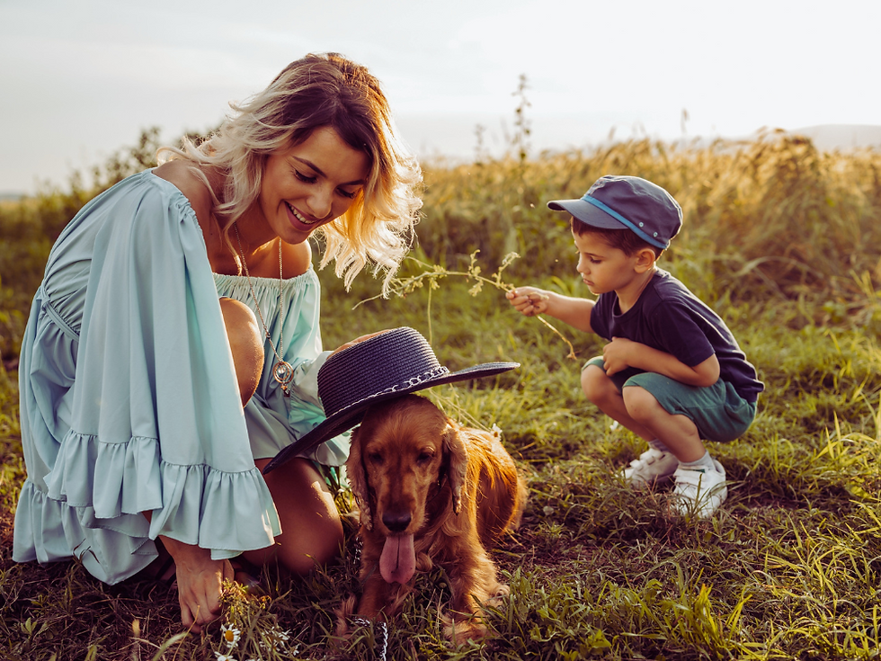 Mom spending time in nature with kids as part of self care ritual