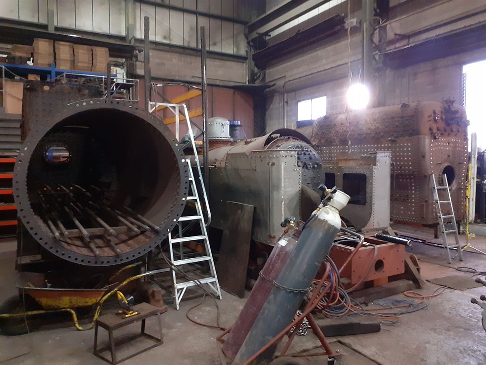 RSH No 56 boiler with front tubeplate removed; boiler, frames and tanks of IoM No 16, 2857’s boiler.