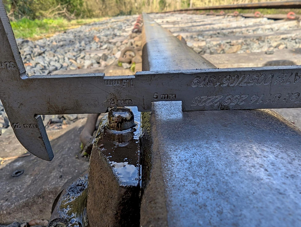 One of the many routine Pway jobs is adjusting the rail greaser activation buttons to apply grease