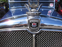 This 1933 Morris Minor in royal blue with its distinct glistening bodywork will be in att
