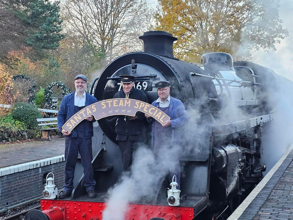 Fireman John Evans, guard Martin Weeks and driver Si Brooks on Martin's final turn. MARTIN BANNISTER