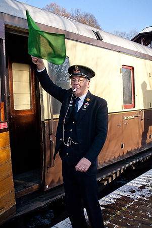 SVR Guard giving the signal to depart.jpg