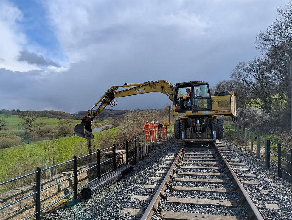 P way staff infilling the embankment at Borle Brook. Brent Cleeton