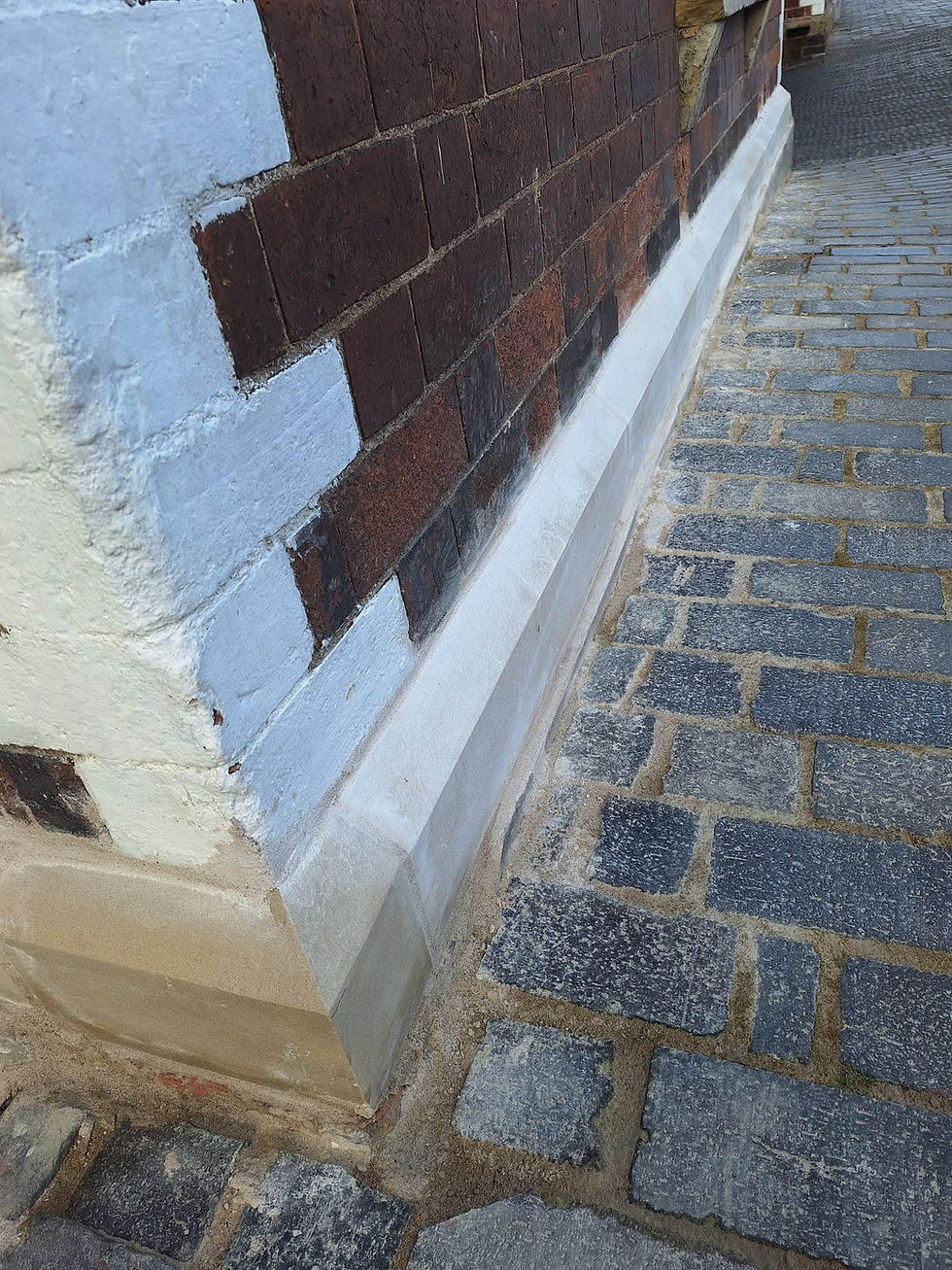 The renewed plinth course. James Pearson