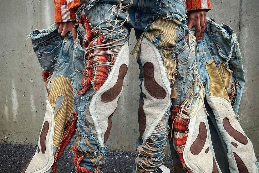 Have you checked out DED Picasso’s latest creation, the “Mocha Coca Scream” denim? This piece is not just a pair of jeans; it’s a statement!