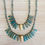 Thumbnail: Thorn and Dagger Knotted Crystal Necklace In Deepwater Blue