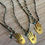 Thumbnail: Hamsa Hand Necklace With Green Quartz Drop