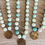 Thumbnail: Fleur Des Lis Charm Necklace With Knotted Amazonite Stones