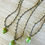 Thumbnail: Earthy Glass Forest Acorn Necklace In Beautiful Spring Green