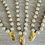Thumbnail: Classic Glass Pearl Necklace And Handmade Marsh Flower Charm