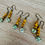 Thumbnail: Spring Showers Golden Bud Earrings With Aqua Flowers
