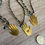 Thumbnail: Hamsa Hand Necklace With Green Quartz Drop