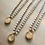 Thumbnail: Champagne Bubble Handmade Portal Pendant Crocheted Necklace