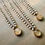 Thumbnail: Champagne Bubble Handmade Portal Pendant Crocheted Necklace