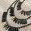 Thumbnail: Thorn and Dagger Knotted Crystal Necklace In Black