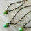 Thumbnail: Earthy Glass Forest Acorn Necklace In Beautiful Spring Green