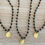 Thumbnail: Art Deco Shell Charm Necklace With Freshwater Pearl Drop