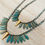 Thumbnail: Thorn and Dagger Knotted Crystal Necklace In Deepwater Blue