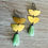 Thumbnail: Double Half Moon Earrings With Mint Crystal Drop