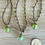Thumbnail: Earthy Glass Forest Acorn Necklace In Beautiful Spring Green