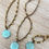 Thumbnail: Carved Stone Amazonite Flower On Crocheted Crystal Strand