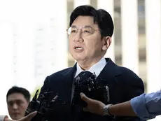 Bang Si-Hyuk, a chairman of Hybe, answers reporters' question upon his arrival at the Seoul Metropolitan Police Agency in Seoul, South Korea, on Sept. 15, 2025