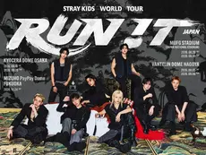 A poster for Stray Kids’ RUN IT world tour, promoting regional destinations during the group’s Seoul concert