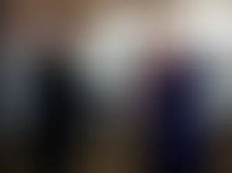 Donald Trump (R) shakes hands with Elon Musk at a campaign event in Butler, Pennsylvania, in October 2024