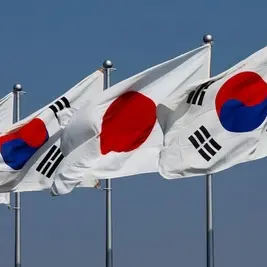 A view of South Korean and Japanese national flags in Tokyo, Japan, March 16, 2023