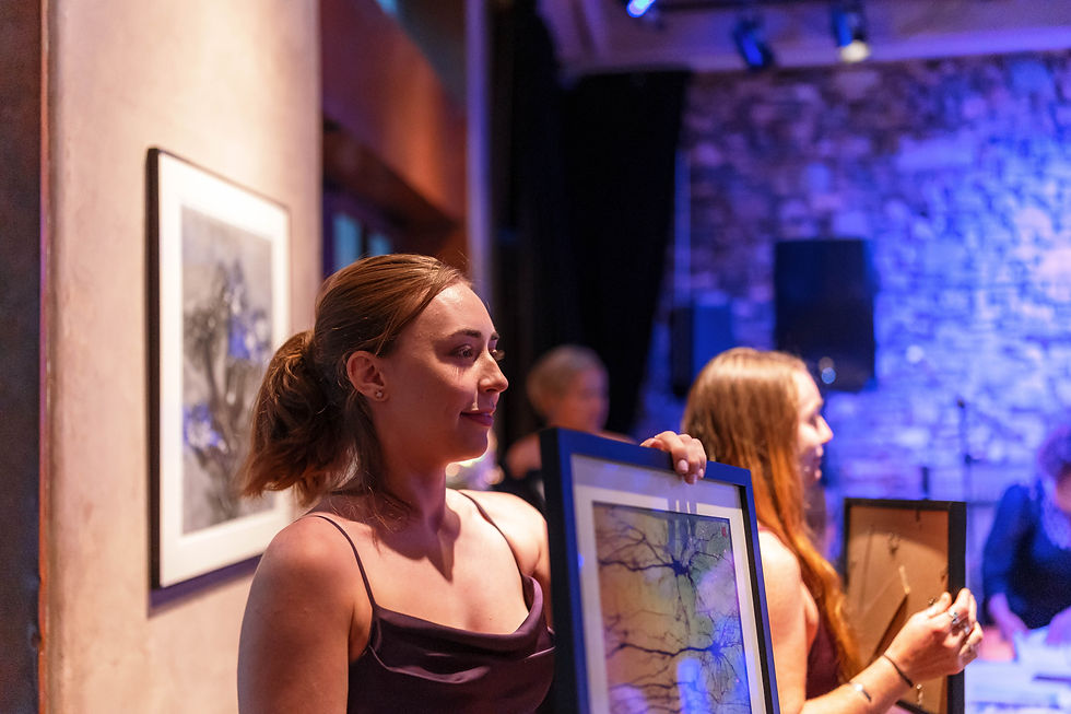Team sharing Greg Dunn Neuro Art for at our Live Auction