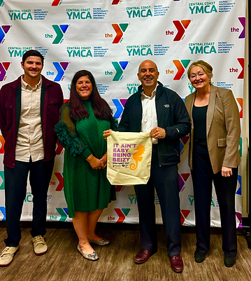 Wendy Steel, Jimmy Panetta with Amy Grames at the YMCA Monterey