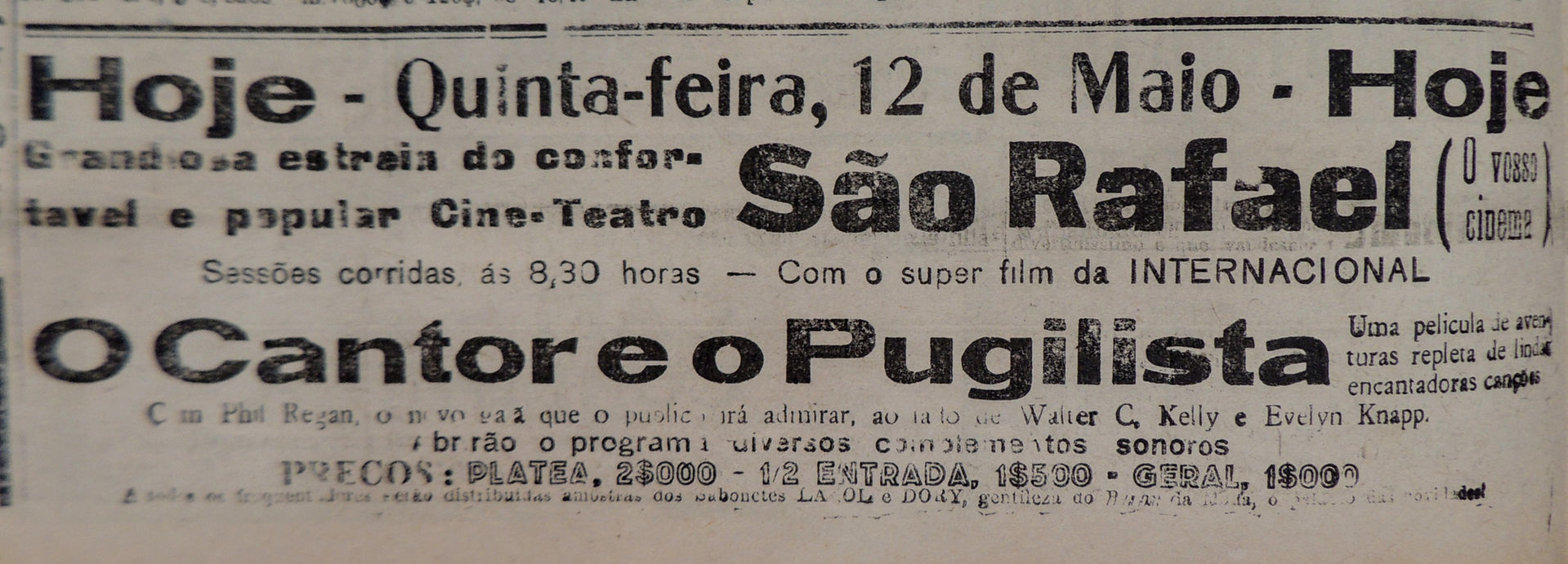 Anúncio histórico de jornal do Cine-Teatro São Rafael datado de quinta-feira, 12 de maio, promovendo a exibição do filme 'O Cantor e o Pugilista' com sessões às 8h30, incluindo preços dos ingressos (platéia 2$000, 1meia entrada 1$500, geral 1$000) e informações sobre o cinema popular da época.