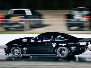Buddy Hull Thrills Behind Wheel of World Record Mustang