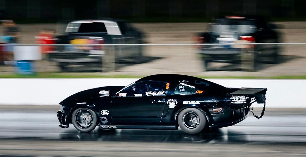 Buddy Hull Thrills Behind Wheel of World Record Mustang