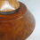 Thumbnail: Redwood burl cremation capsule urn.