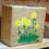 Thumbnail: hand painted white oak box urn with sunflower seen.