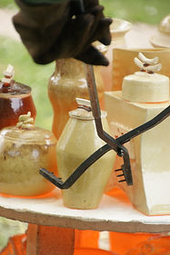 removing hot pots w: tongs.jpg