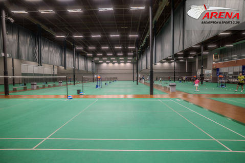 Indoor badminton court with players visible, and Arena Badminton & Sports Club.