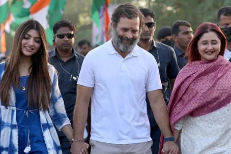 Rahul Gandhi holds Rashami Desai, Akanksha Puri's hands as they walk together during Bharat Jodo Yat