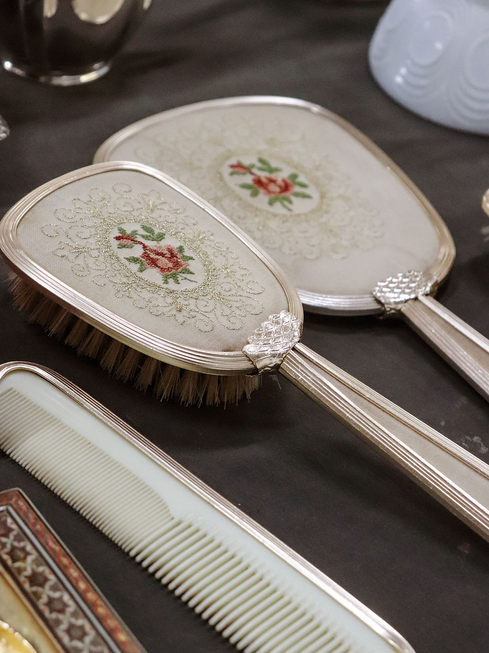 Vintage embroidered hand mirror, hairbrush and comb dressing table set