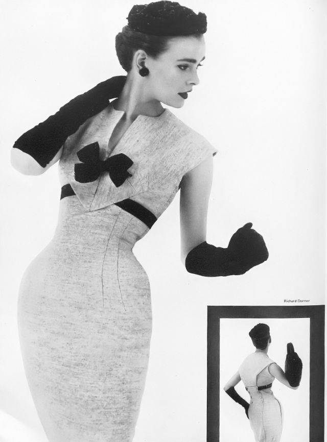 Black-and-white fashion ad for Susan Small. A photo of a model in a fitted dress and long black gloves, posed on white background with a rear-view inset.