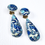 Thumbnail: blue and white fish motif clip on earrings with teardrop drops on white background