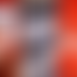 Close-up of three football shirt tags: Adidas with flags, Umbro with "Made in England," and a red Candy jersey with a blurred pattern.