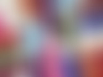 Colourful vintage gloves arranged on a white background, featuring shades of pink, blue, green, red, and white, creating a vibrant pattern.