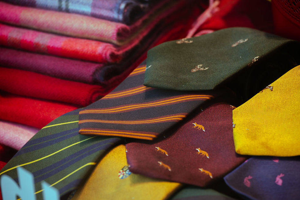 Selection of vintage neckties showing changing styles, widths and patterns from different decades.