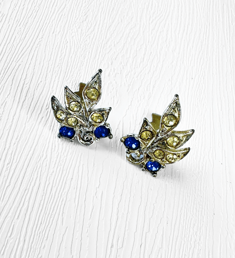 Pair of vintage leaf design clip on earrings with blue and clear stones