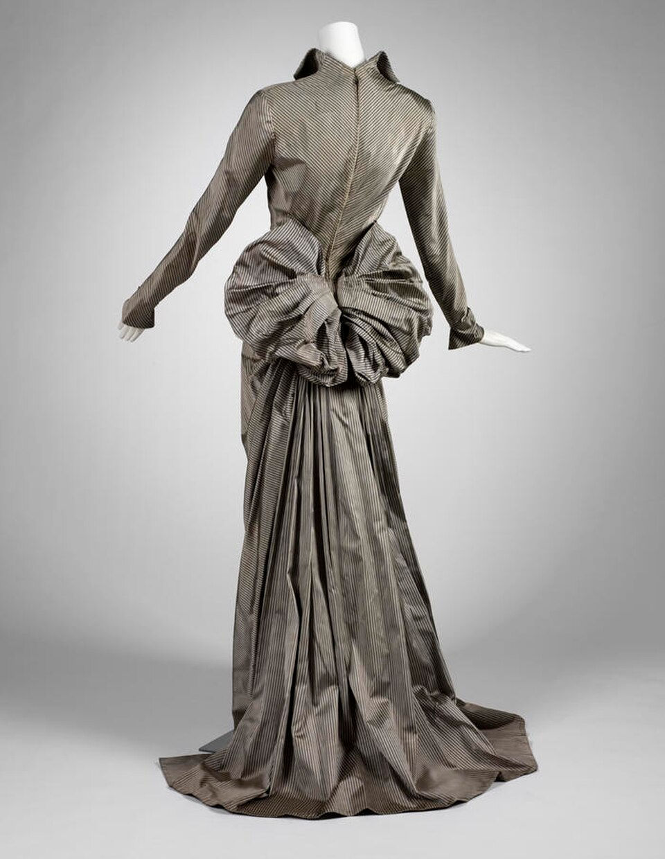1945 evening gown with a dramatic oversized bow at the back