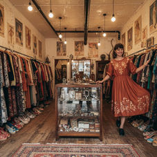 Shopper browsing at vintage clothing store